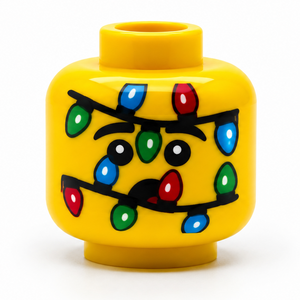 A yellow LEGO minifigure head with a festive Christmas tree light print on the front, isolated on a white background.